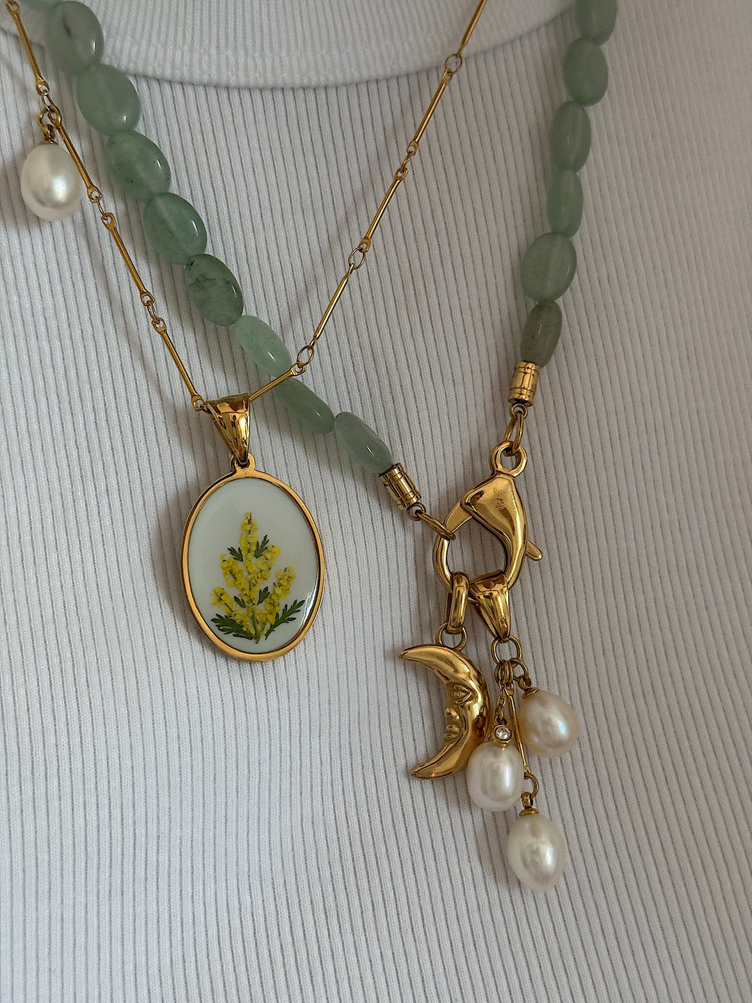 NUDE pendant.