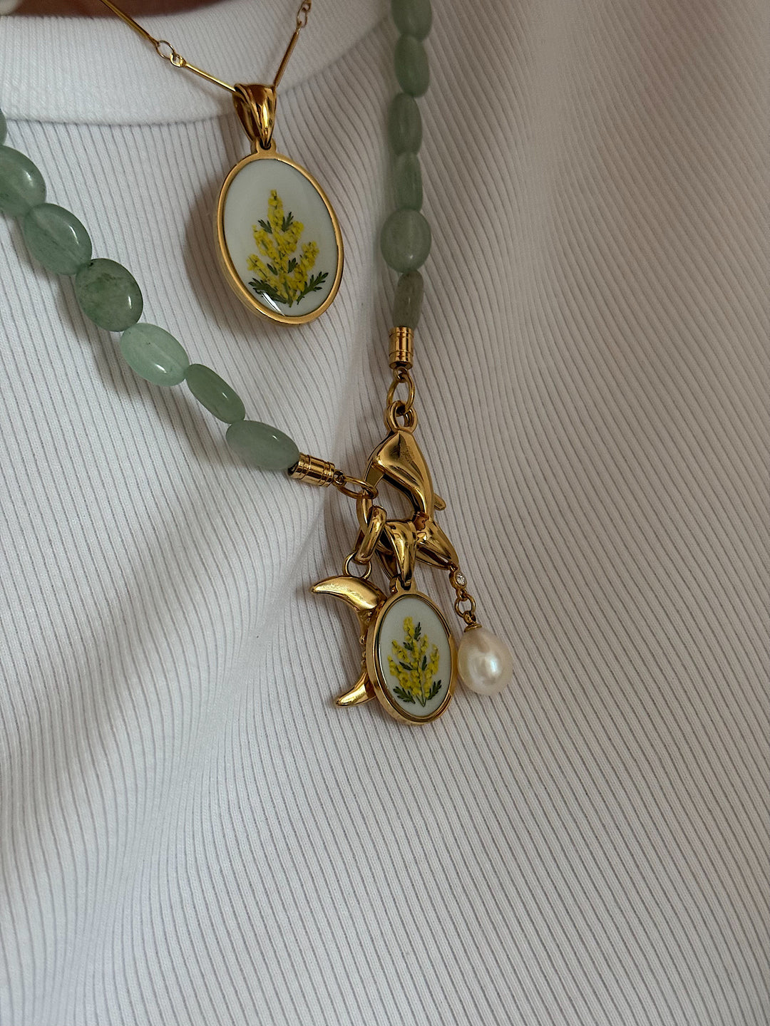 NUDE pendant.