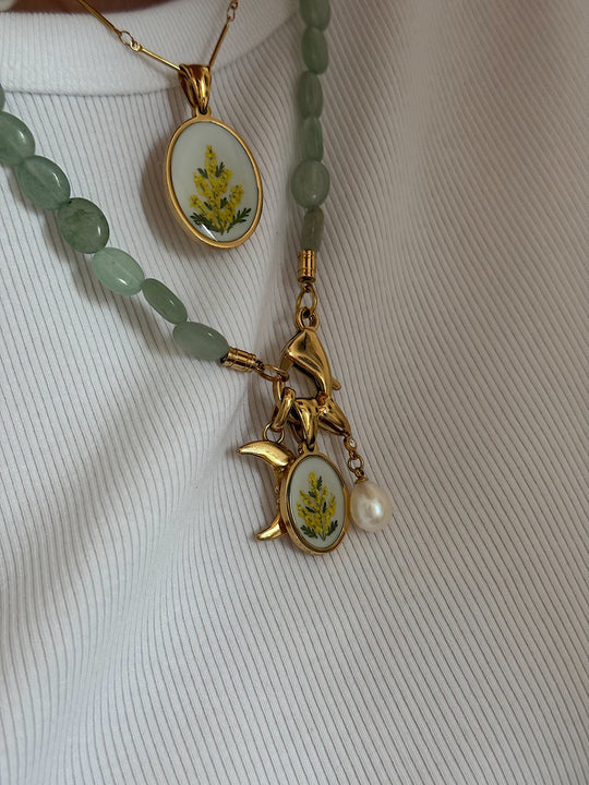 NUDE pendant.